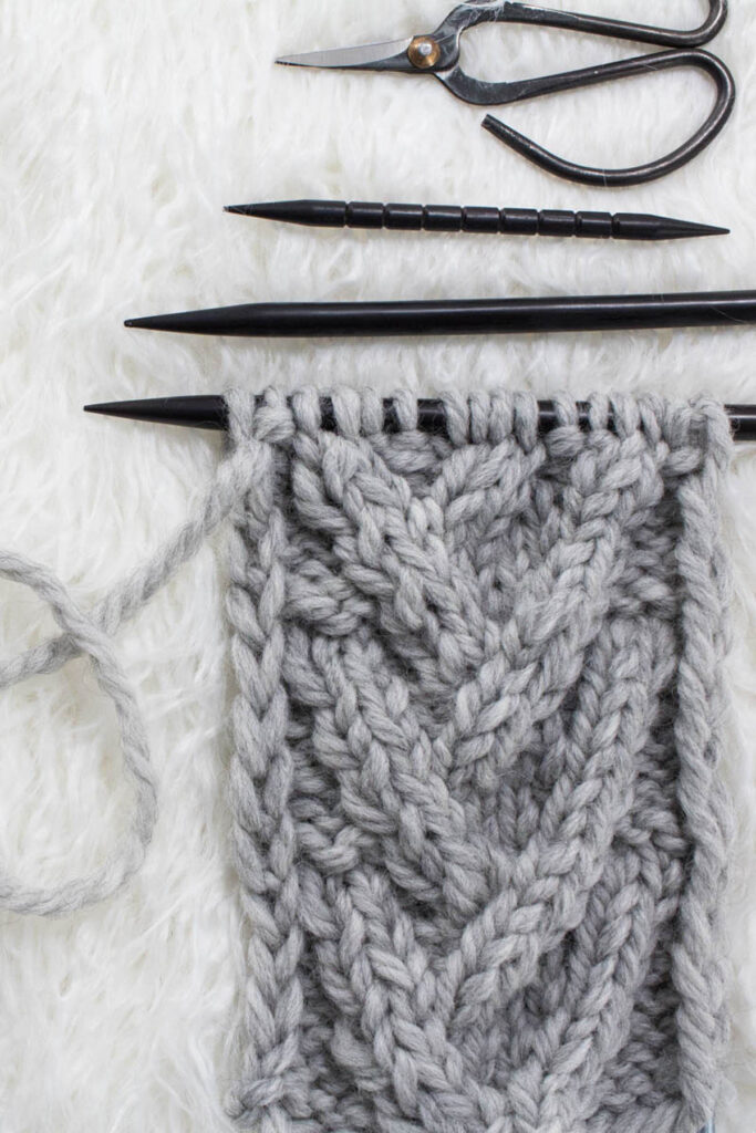https://www.bromefields.com/wp-content/uploads/2019/10/open-v-cable-knit-stitch-pattern-pin-683x1024.jpg