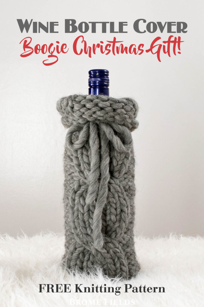 cable knitted wine bottle cover displayed on a wine bottle.