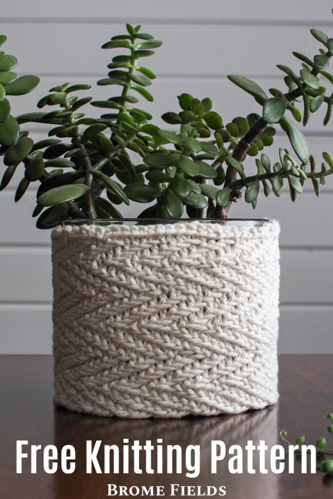 pic of a herringbone stitch knitted plant pot cover