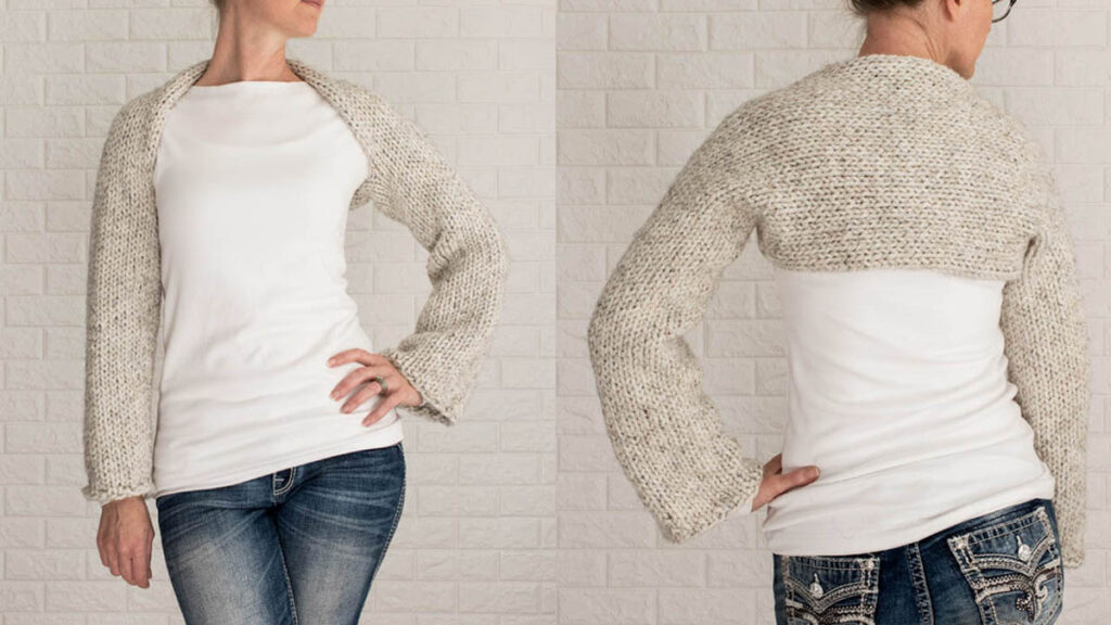 model wearing an easy Shrug Sweater Crop Top knitted in the stockinette stitch without seams