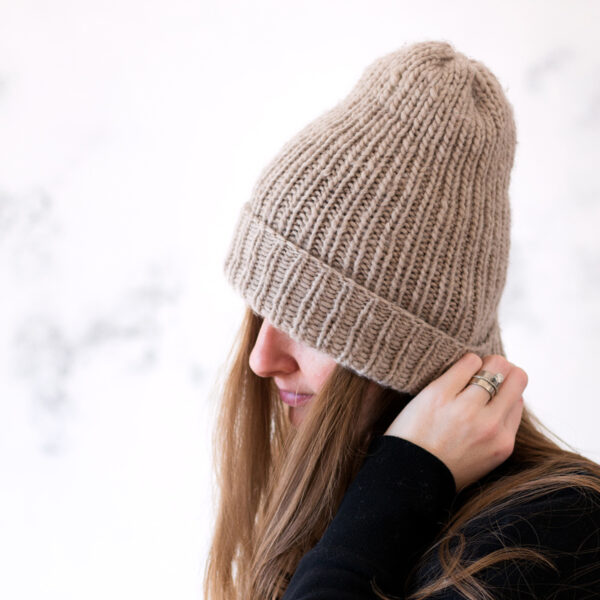 model wearing a basic beanie knitted hat