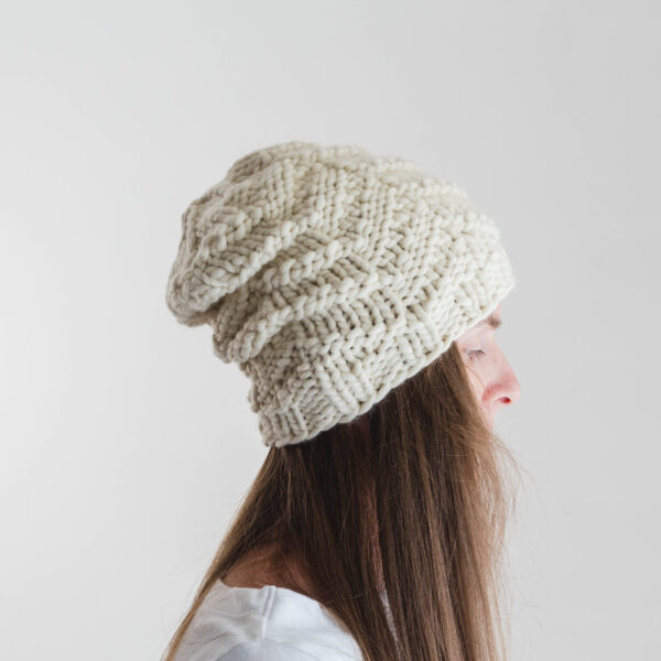 model wearing a chevron knit hat