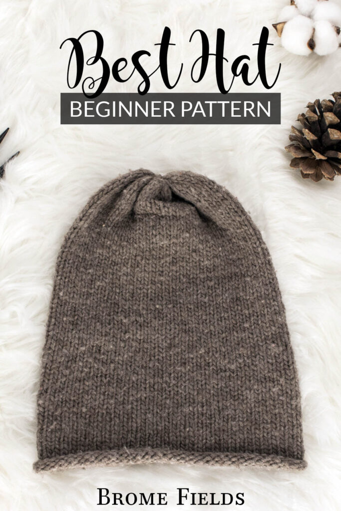 beginner stockinette stitch knit hat displayed on faux fur blanket