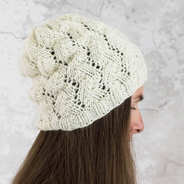 model wearing a herringbone lace knit hat