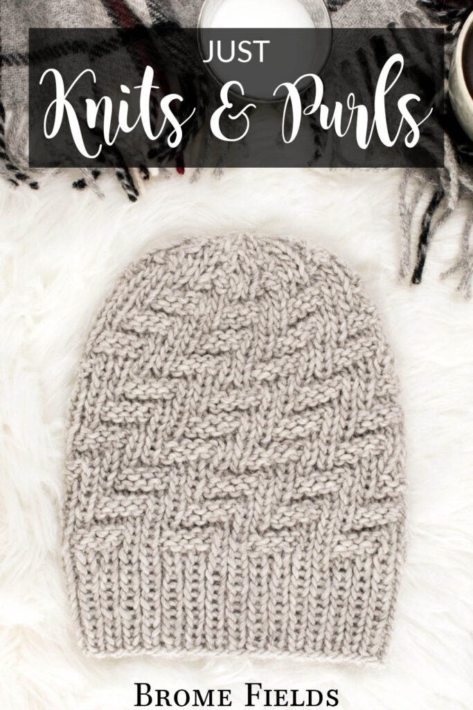 knit & purl hat displayed on faux fur blanket